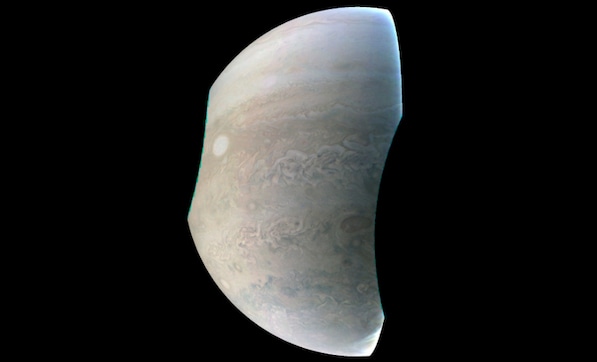 Juno probe reveals crescent shaped Jupiter with iconic Great Red Spot Juno probe reveals crescent shaped Jupiter with iconic Great Red Spot