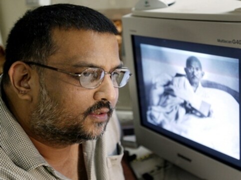 Khadi calendar row: Gandhi's grandson attacks Modi, says polyester 'model' has stolen charkha Khadi calendar row: Gandhi's grandson attacks Modi, says polyester 'model' has stolen charkha