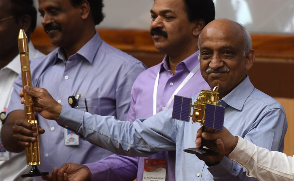 Indian Space Research Organisation (ISRO) chairman Kiran Kumar Rao (R) displays models of the CARTOSAT-2 and Polar Satellite Launch Vehicle (PSLV-C37) as he speaks to media after the launch of the Polar Satellite Launch Vehicle (PSLV-C37) at Sriharikota on Wednesday. AFP Indian Space Research Organisation (ISRO) chairman Kiran Kumar Rao (R) displays models of the CARTOSAT-2 and Polar Satellite Launch Vehicle (PSLV-C37) as he speaks to media after the launch of the Polar Satellite Launch Vehicle (PSLV-C37) at Sriharikota on Wednesday. AFP