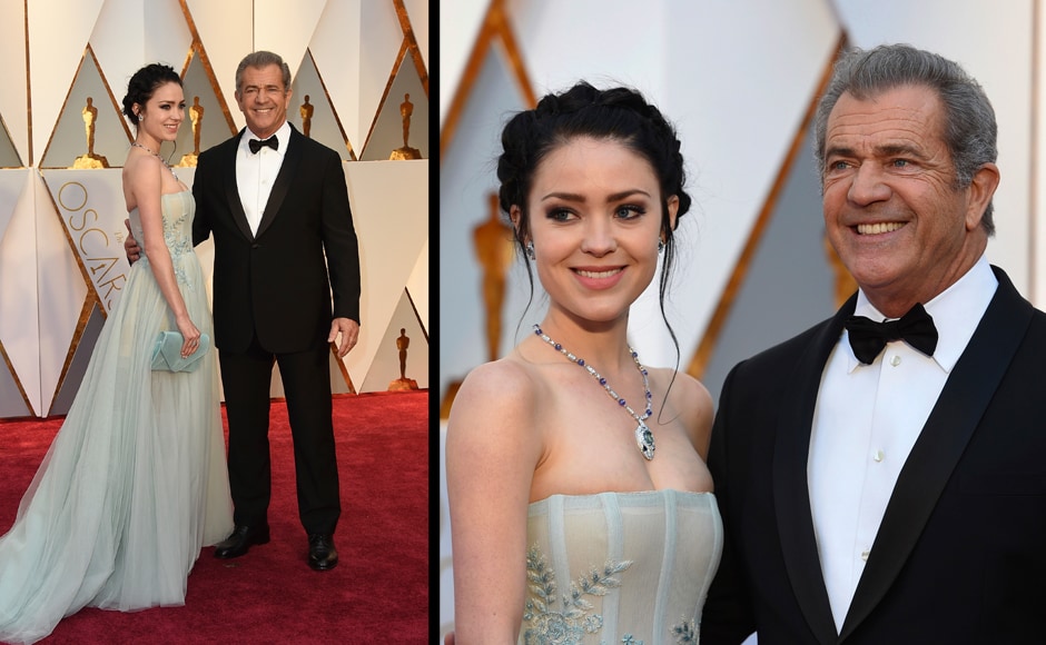 Rosalind Ross (left) and Mel Gibson arrive at the Oscars on Sunday, 26 February 2017, at the Dolby Theatre in Los Angeles. AP Rosalind Ross (left) and Mel Gibson arrive at the Oscars on Sunday, 26 February 2017, at the Dolby Theatre in Los Angeles. AP