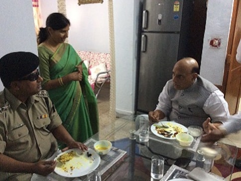 Rajnath Singh visits visually-impaired BSF officer's home for lunch, lauds his service to the nation Rajnath Singh visits visually-impaired BSF officer's home for lunch, lauds his service to the nation
