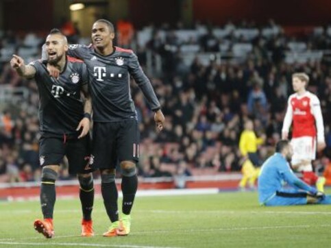 Champions League: Bayern Munich humiliate 10-man Arsenal to move into quarter-finals Champions League: Bayern Munich humiliate 10-man Arsenal to move into quarter-finals