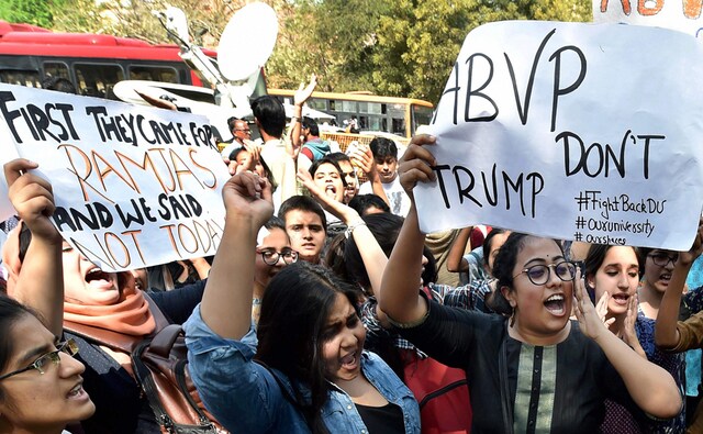 The students held placards with messages like "Save the varsities from the onslaught of ABVP" and "Your nationalism is not above our democracy". PTI The students held placards with messages like "Save the varsities from the onslaught of ABVP" and "Your nationalism is not above our democracy". PTI