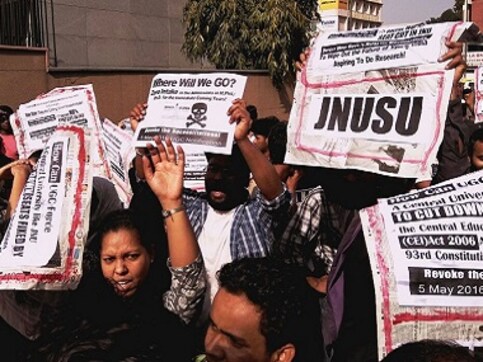 JNU seat cut row: Hiding under garb of 'improving' research is a systematic clampdown on higher education JNU seat cut row: Hiding under garb of 'improving' research is a systematic clampdown on higher education
