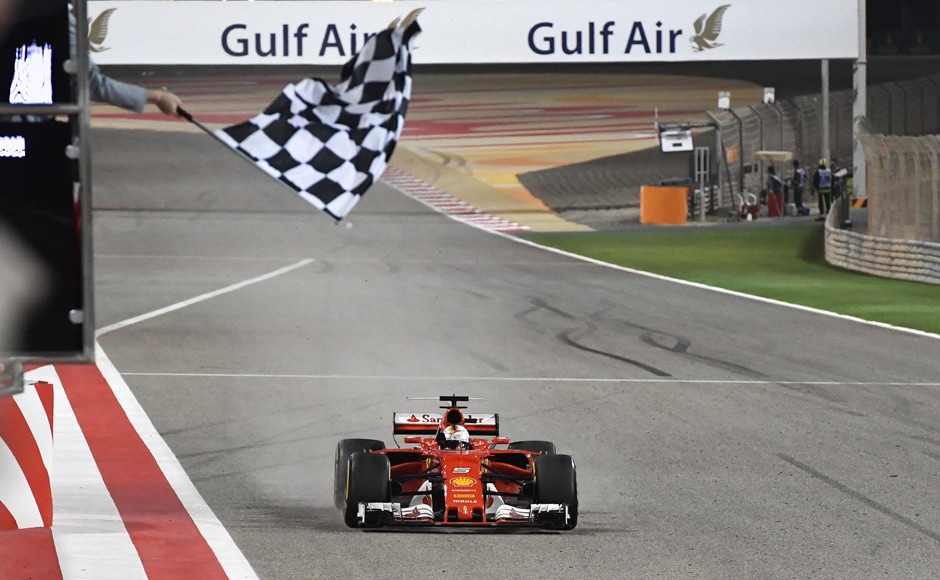 Ferrari driver Sebastian Vettel of Germany crosses the finish line to win the Bahrain Grand Prix. The victory was Vettel's second of the season after the four-times world champion won the opener in Australia. AP Ferrari driver Sebastian Vettel of Germany crosses the finish line to win the Bahrain Grand Prix. The victory was Vettel's second of the season after the four-times world champion won the opener in Australia. AP