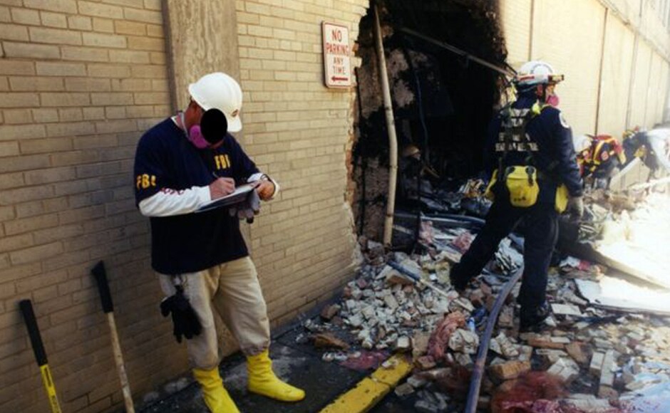 Search and rescue crews examine the crash site. Photo courtesy: FBI Search and rescue crews examine the crash site. Photo courtesy: FBI