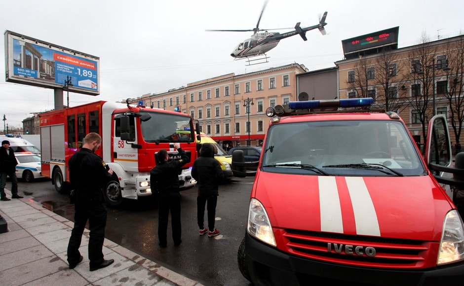 A helicopter flies over the fire trucks after an explosion at Tekhnologichesky Institut subway station in St Petersburg. Hours after the first explosion, anguish and fear rose again when police found and defused a shrapnel-packed explosive device at another St Petersburg station. AP A helicopter flies over the fire trucks after an explosion at Tekhnologichesky Institut subway station in St Petersburg. Hours after the first explosion, anguish and fear rose again when police found and defused a shrapnel-packed explosive device at another St Petersburg station. AP