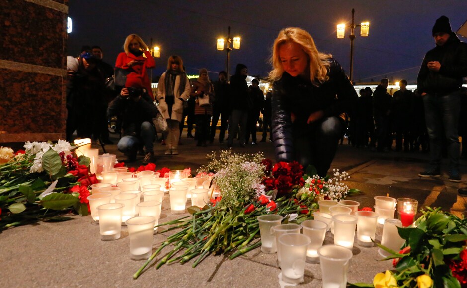 A woman places flowers outside Tekhnologicheskiy Institut metro station in St Petersburg. he entire St. Petersburg subway system was shut down and evacuated, but partial service resumed after about six hours. Reuters A woman places flowers outside Tekhnologicheskiy Institut metro station in St Petersburg. he entire St. Petersburg subway system was shut down and evacuated, but partial service resumed after about six hours. Reuters