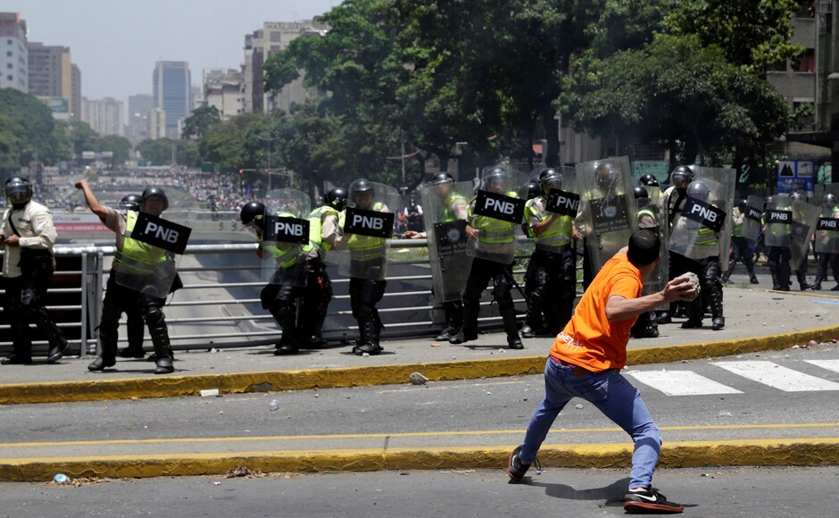Venezuelan security forces quelled masked protesters with tear gas, water cannons and pepper spray in Caracas on Tuesday after blocking an opposition rally against socialist President Nicolas Maduro. Reuters Venezuelan security forces quelled masked protesters with tear gas, water cannons and pepper spray in Caracas on Tuesday after blocking an opposition rally against socialist President Nicolas Maduro. Reuters