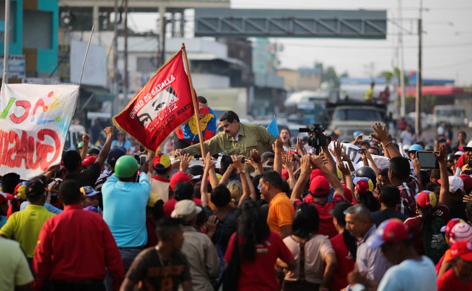 Venezuelean president Nicolas Maduro meets his supporters in Caracas. Reuters Venezuelean president Nicolas Maduro meets his supporters in Caracas. Reuters