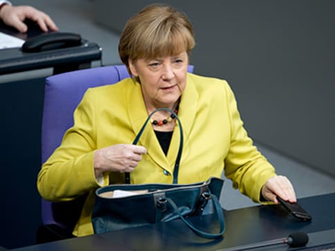 Angela Merkel says Germany must help France's Emmanuel Macron succeed Angela Merkel says Germany must help France's Emmanuel Macron succeed