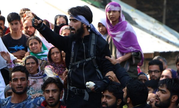 Kashmiris defy curfew to attend funeral of Hizbul commander Sabzar Bhat on first day of Ramadan Kashmiris defy curfew to attend funeral of Hizbul commander Sabzar Bhat on first day of Ramadan