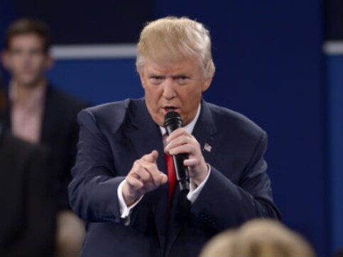Comedian Kathy Griffin holds up what looks like Trump's severed head; apologises later Comedian Kathy Griffin holds up what looks like Trump's severed head; apologises later