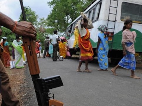 Three Maoists, including minor surrender before Odisha police; carried reward on their heads Three Maoists, including minor surrender before Odisha police; carried reward on their heads