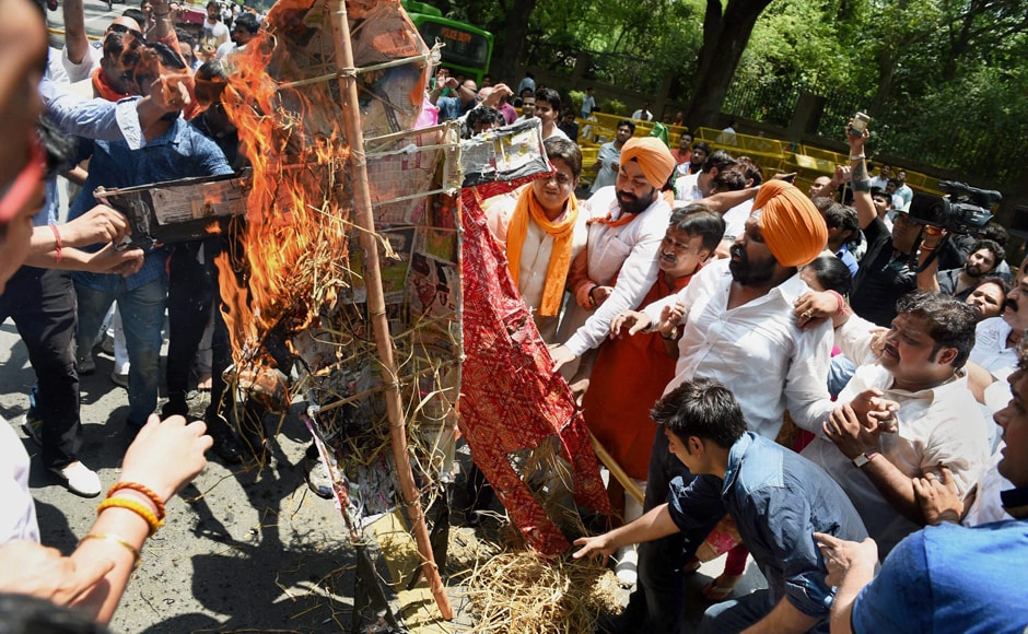 BJP workers demanded an apology from Congress president Sonia Gandhi and the arrest of Congress leaders involved in slaughtering the calf in Kerala. They also burnt effigies of Sonia and Congress vice-president Rahul Gandhi. PTI BJP workers demanded an apology from Congress president Sonia Gandhi and the arrest of Congress leaders involved in slaughtering the calf in Kerala. They also burnt effigies of Sonia and Congress vice-president Rahul Gandhi. PTI