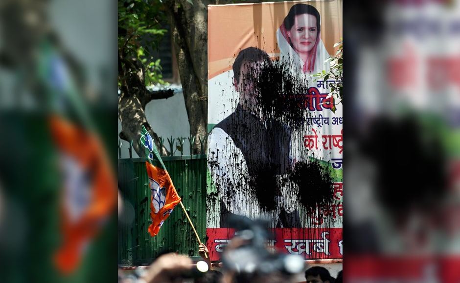Members of Bhartiya Janta Yuva Morcha on Tuesday held a protest outside Congress headquarters in Delhi. They were protesting against the slaughter of a calf by Congress' youth wing workers in Kerala. They also blackened the poster of Congress leaders. PTI Members of Bhartiya Janta Yuva Morcha on Tuesday held a protest outside Congress headquarters in Delhi. They were protesting against the slaughter of a calf by Congress' youth wing workers in Kerala. They also blackened the poster of Congress leaders. PTI