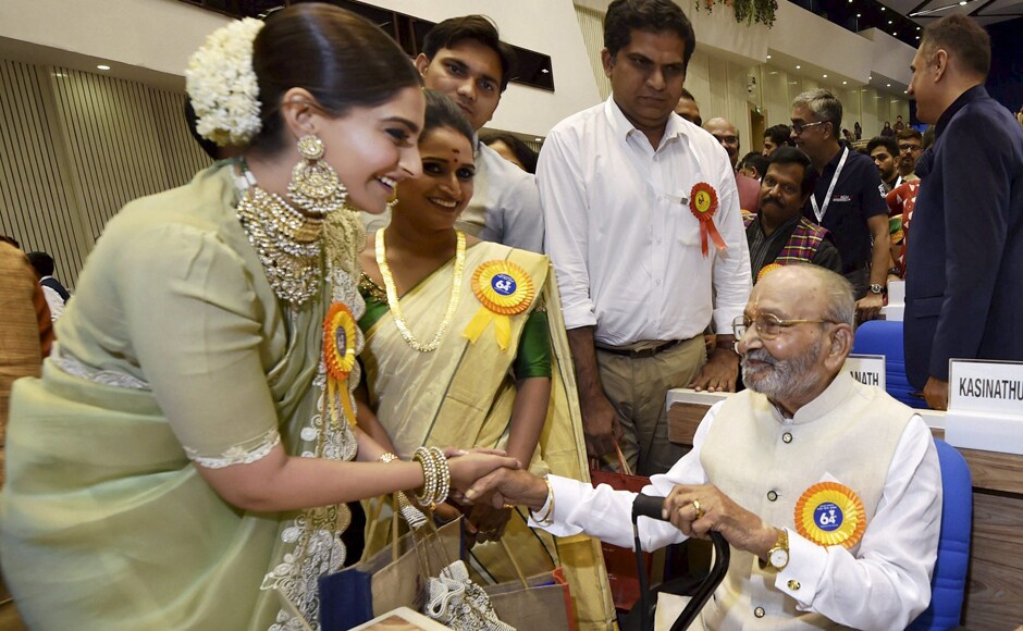 Sonam Kapoor greets Telugu filmmaker K Vishwanath as Surabhi CM looks on. PTI Sonam Kapoor greets Telugu filmmaker K Vishwanath as Surabhi CM looks on. PTI