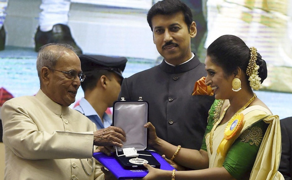 Pranab Mukherjee and Rajyavardhan Singh Rathore present Best Actress Award to Surabhi CM. PTI Pranab Mukherjee and Rajyavardhan Singh Rathore present Best Actress Award to Surabhi CM. PTI