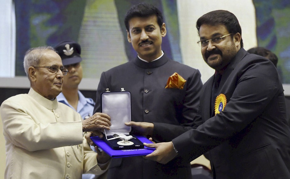 President Pranab Mukherjee and MoS for I&B Rajyavardhan Singh Rathore present Special Jury Award to Malayalam actor Mohanlal. PTI President Pranab Mukherjee and MoS for I&B Rajyavardhan Singh Rathore present Special Jury Award to Malayalam actor Mohanlal. PTI
