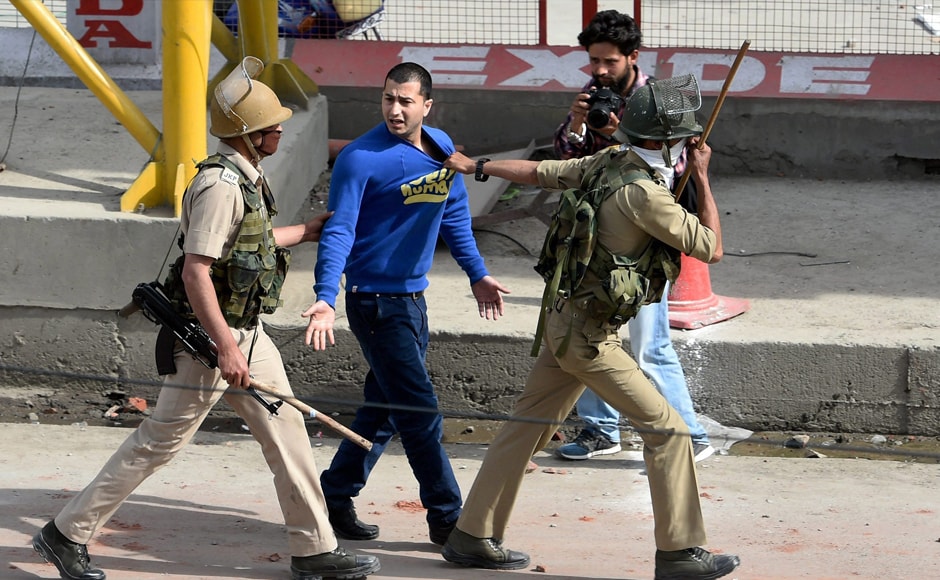 A clash broke out between students and law enforcing agencies outside Women's College in Srinagar on Tuesday against alleged highhandedness of the police. PTI A clash broke out between students and law enforcing agencies outside Women's College in Srinagar on Tuesday against alleged highhandedness of the police. PTI