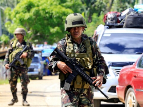 Philippine troops battle Islamist militants as reports emerge of gunmen murdering civilians Philippine troops battle Islamist militants as reports emerge of gunmen murdering civilians