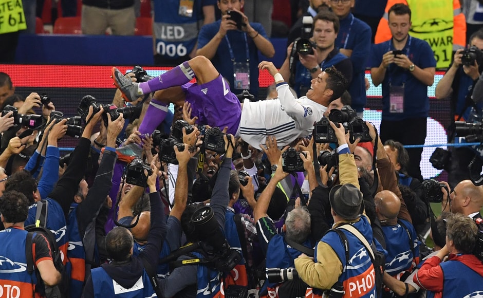 Real Madrid's Portuguese striker Cristiano Ronaldo celebrates after winning the UEFA Champions League final football match between Juventus and Real Madrid at The Principality Stadium in Cardiff. AFP Real Madrid's Portuguese striker Cristiano Ronaldo celebrates after winning the UEFA Champions League final football match between Juventus and Real Madrid at The Principality Stadium in Cardiff. AFP