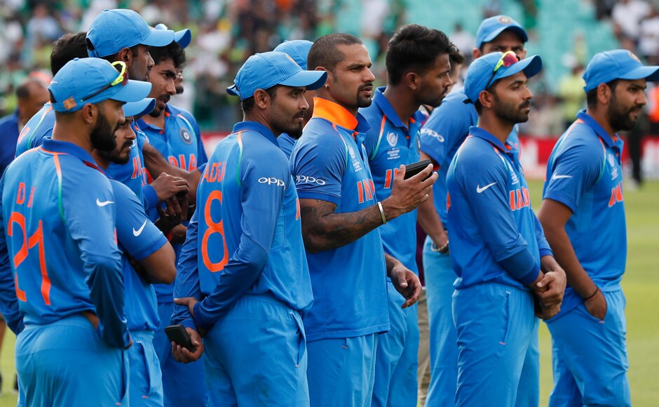 India's players look on as Pakistan team celebrate their win after the match. AP India's players look on as Pakistan team celebrate their win after the match. AP