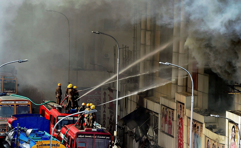 A huge fire gutted a leading textile showroom in Chennai's downtown T Nagar on Wednesday morning, continued to rage on through Thursday morning, more than 24 hours after it broke out. PTI A huge fire gutted a leading textile showroom in Chennai's downtown T Nagar on Wednesday morning, continued to rage on through Thursday morning, more than 24 hours after it broke out. PTI
