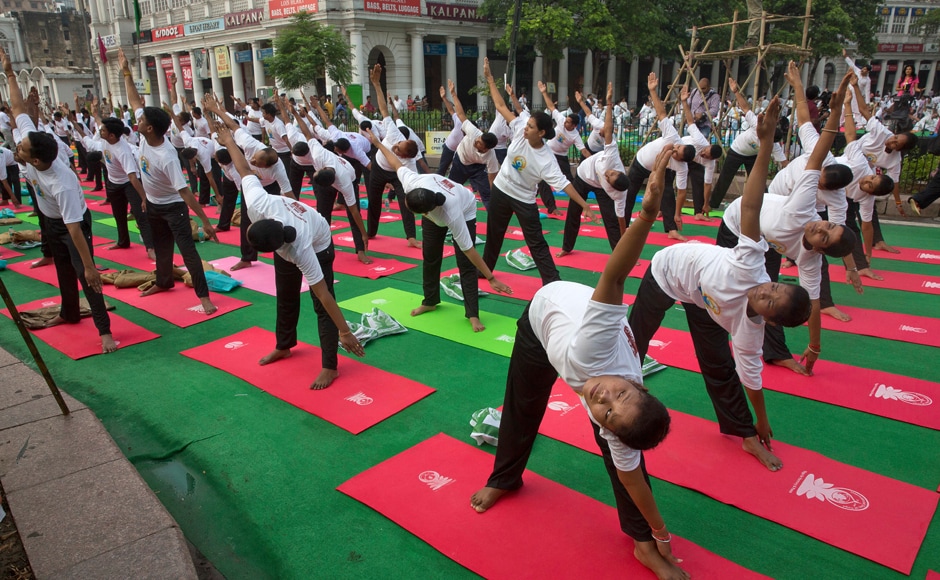 From the United Nations to the Great Wall of China, from Machu Pichu to Milan, yoga fever gripped the world. AP From the United Nations to the Great Wall of China, from Machu Pichu to Milan, yoga fever gripped the world. AP
