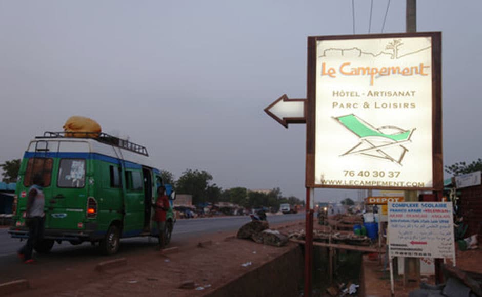 A sign board on the road shows Campement Kangaba resort. AP A sign board on the road shows Campement Kangaba resort. AP