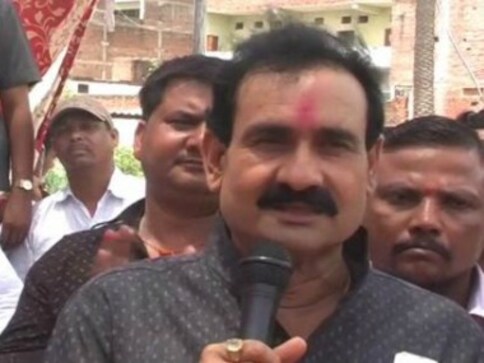EC disqualifies Madhya Pradesh minister Narottam Mishra for three years in paid news case EC disqualifies Madhya Pradesh minister Narottam Mishra for three years in paid news case