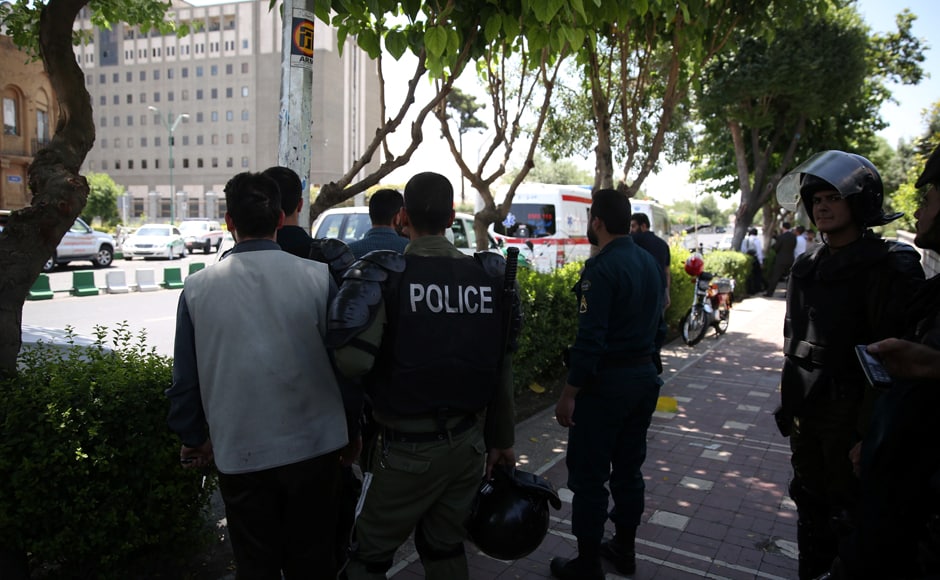 Iranian police near the Parliament during the attack in central Tehran, Iran on Wednesday. Tima via Reuters Iranian police near the Parliament during the attack in central Tehran, Iran on Wednesday. Tima via Reuters