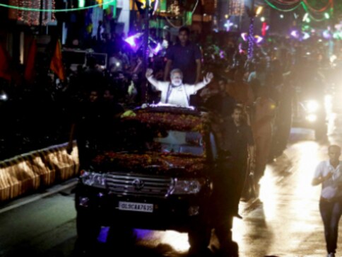 Narendra Modi in Gujarat: PM gets a victor's welcome in Rajkot where he won his first election Narendra Modi in Gujarat: PM gets a victor's welcome in Rajkot where he won his first election