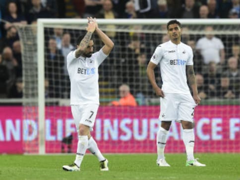 Premier League: Swansea City captain Leon Britton signs improved one-year deal with club Premier League: Swansea City captain Leon Britton signs improved one-year deal with club