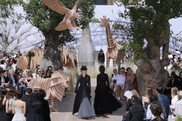Models present creations for Christian Dior during the 2017 fall/winter Haute Couture collection in Paris on July 3, 2017. AFP PHOTO Models present creations for Christian Dior during the 2017 fall/winter Haute Couture collection in Paris on July 3, 2017. AFP PHOTO