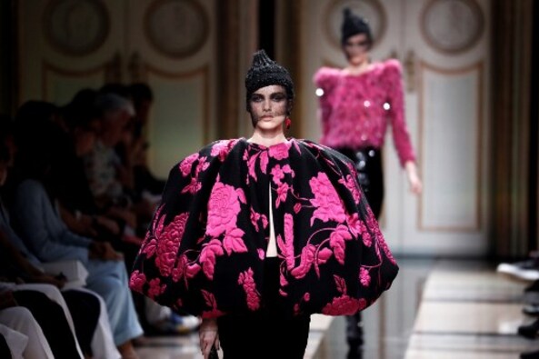 A model presents a creation by Giorgio Armani during the 2017-2018 fall/winter Haute Couture collection in Paris on July 4, 2017. AFP PHOTO A model presents a creation by Giorgio Armani during the 2017-2018 fall/winter Haute Couture collection in Paris on July 4, 2017. AFP PHOTO