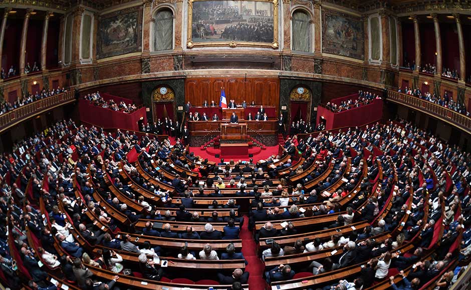 Laying out his political, security and diplomatic priorities, Macron vowed to lift a state of emergency that has been in place since 2015 but also to harden permanent security measures to fight Islamic extremism and other threats. AP Laying out his political, security and diplomatic priorities, Macron vowed to lift a state of emergency that has been in place since 2015 but also to harden permanent security measures to fight Islamic extremism and other threats. AP