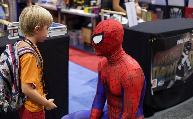 A child talks to a cosplayer dressed as Spider-Man. Image from Facebook A child talks to a cosplayer dressed as Spider-Man. Image from Facebook