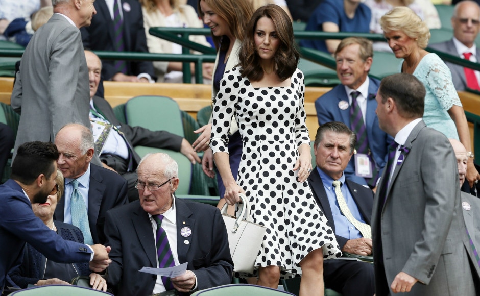 Britain's Kate, the Duchess of Cambridge takes her seat in the Royal Box on the opening day at the Wimbledon Tennis Championships. AP Photo Britain's Kate, the Duchess of Cambridge takes her seat in the Royal Box on the opening day at the Wimbledon Tennis Championships. AP Photo