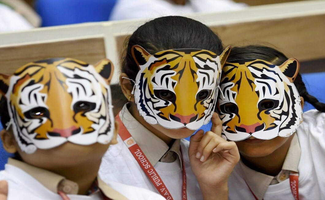 India is currently home to 70 percent of the world's tiger population in over 17 states and 50 sanctuaries across the country. In this picture, students from Delhi celebrate Global Tiger Day by wearing tiger masks. PTI India is currently home to 70 percent of the world's tiger population in over 17 states and 50 sanctuaries across the country. In this picture, students from Delhi celebrate Global Tiger Day by wearing tiger masks. PTI