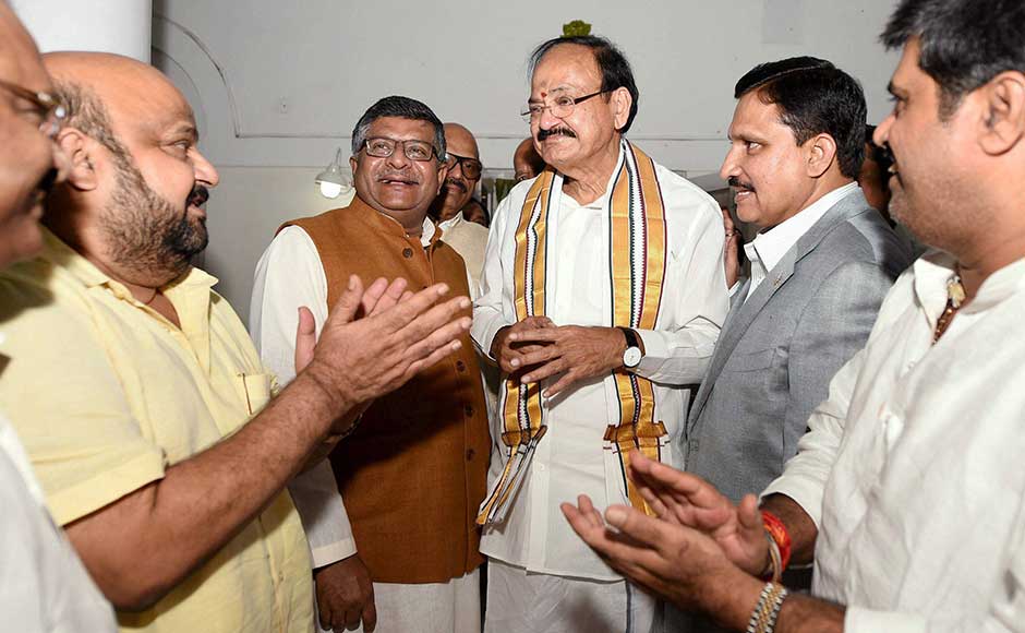 The two-time BJP president is pitted against Gopalkrishna Gandhi, who was chosen by an alliance of 18 Opposition parties, including the Congress. In this image, Naidu is greeted by Law Minister Ravi Shanker Prasad and MPs from Andhra Pradesh. PTI The two-time BJP president is pitted against Gopalkrishna Gandhi, who was chosen by an alliance of 18 Opposition parties, including the Congress. In this image, Naidu is greeted by Law Minister Ravi Shanker Prasad and MPs from Andhra Pradesh. PTI