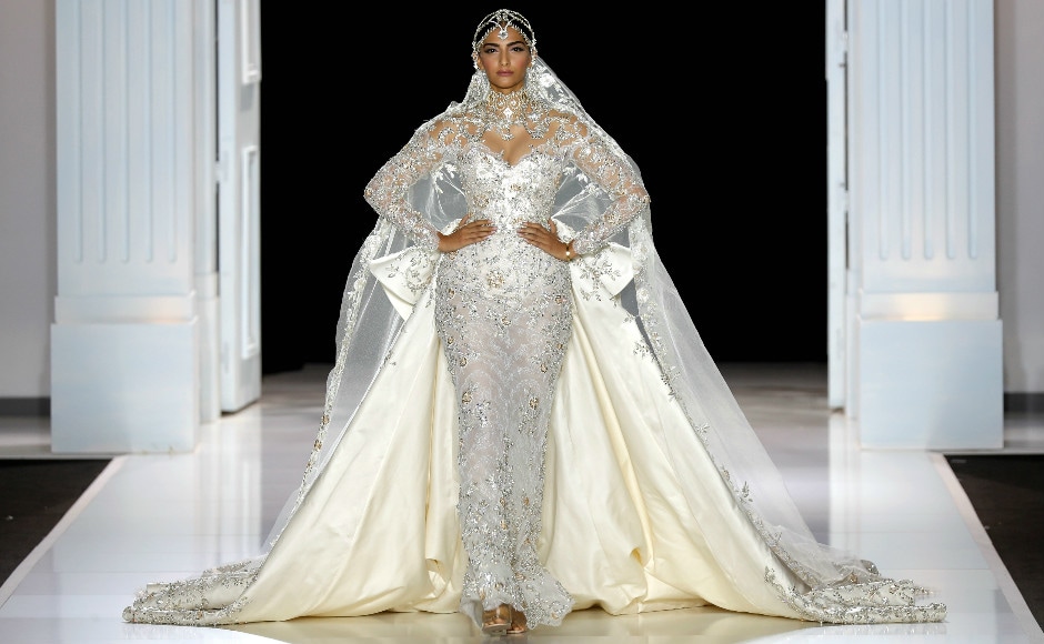 Sonam was the showstopper for Ralph & Russo — a label she has sported on the red carpet at events like the Cannes Film Fest. The show was part of the ongoing Paris Haute Couture 2017. Image: Reuters Sonam was the showstopper for Ralph & Russo — a label she has sported on the red carpet at events like the Cannes Film Fest. The show was part of the ongoing Paris Haute Couture 2017. Image: Reuters