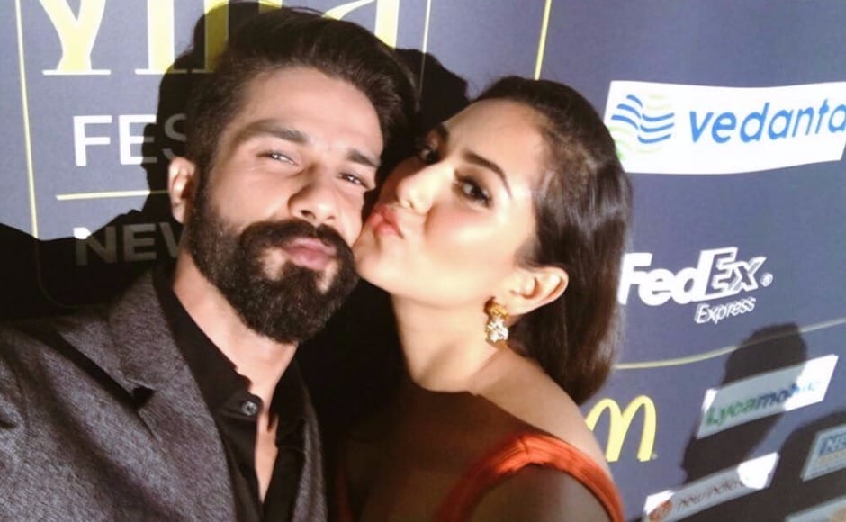 Shahid and Mira pose for a selfie on the IIFA green carpet. Image via Twitter Shahid and Mira pose for a selfie on the IIFA green carpet. Image via Twitter