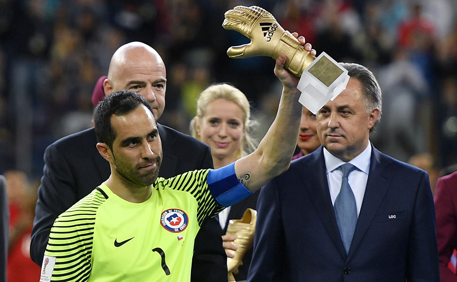 Chile goalkeeper Claudio Bravo holds the trophy as best goalkeeper in the Confederations Cup. AP Chile goalkeeper Claudio Bravo holds the trophy as best goalkeeper in the Confederations Cup. AP