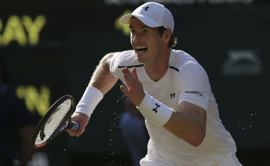 Defending champion Andy Murray dismissed German Dustin Brown 6-3, 6-2, 6-2 in Round 2 on Day 3 of Wimbledon. AP Defending champion Andy Murray dismissed German Dustin Brown 6-3, 6-2, 6-2 in Round 2 on Day 3 of Wimbledon. AP
