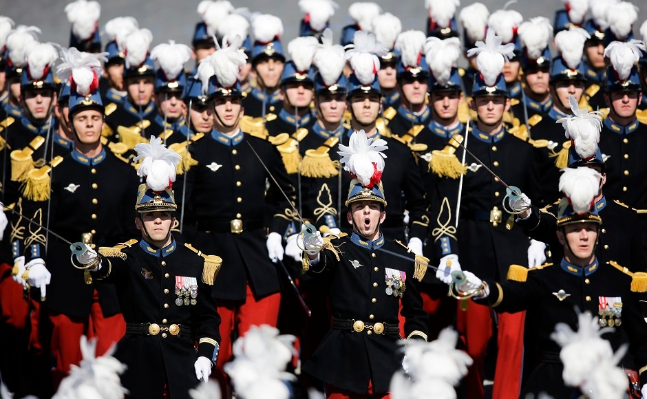 Soldiers of both the countries marched down the Champs-Elysees together, marking the friendship between the United States and France. AP Soldiers of both the countries marched down the Champs-Elysees together, marking the friendship between the United States and France. AP