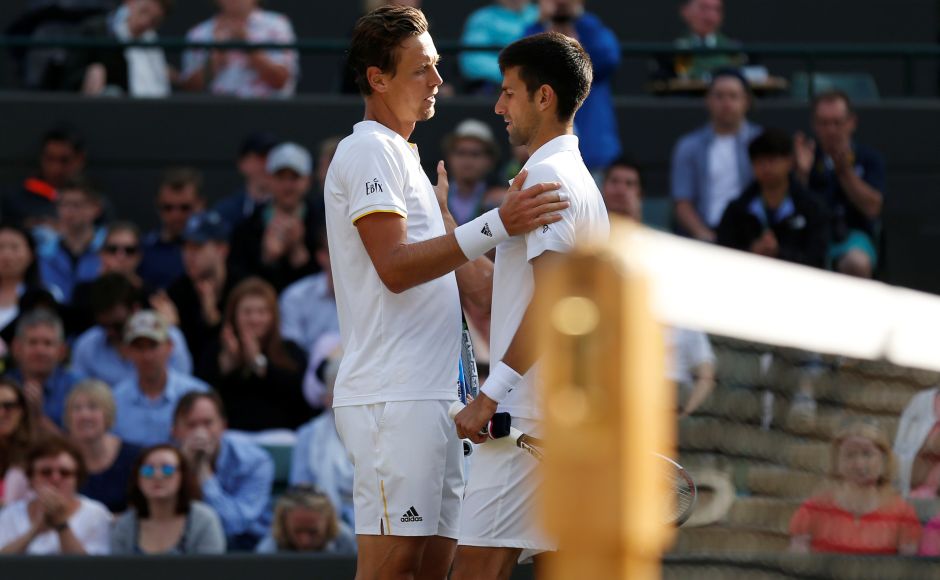 Novak Djokovic retired with an injury from his quarterfinal match at Wimbledon, putting Tomas Berdych into the semi-finals. Reuters Novak Djokovic retired with an injury from his quarterfinal match at Wimbledon, putting Tomas Berdych into the semi-finals. Reuters