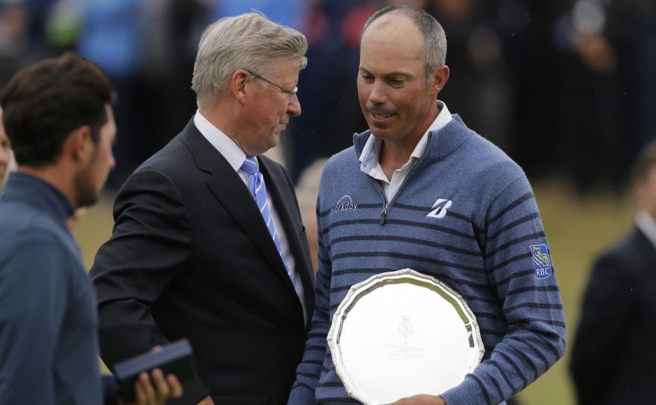 Matt Kuchar holds the silver plate as runner-up in the British Open. AP Matt Kuchar holds the silver plate as runner-up in the British Open. AP