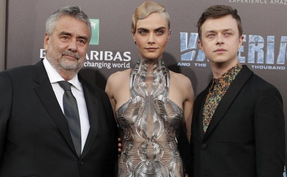 Director Luc Besson with his protagonists, Laureline and Valerian, at the premiere. Image from Getty Images. Director Luc Besson with his protagonists, Laureline and Valerian, at the premiere. Image from Getty Images.