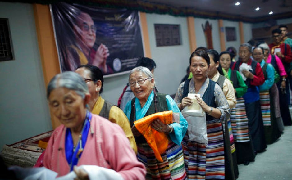 Old women queue up to offer prayers to the Dalai Lama in Lalitpur of Nepal on Thursday. AP Old women queue up to offer prayers to the Dalai Lama in Lalitpur of Nepal on Thursday. AP